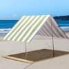 Beach Tent in Sage and White Stripe beach shade set up on beach with sun shining on beach shelter